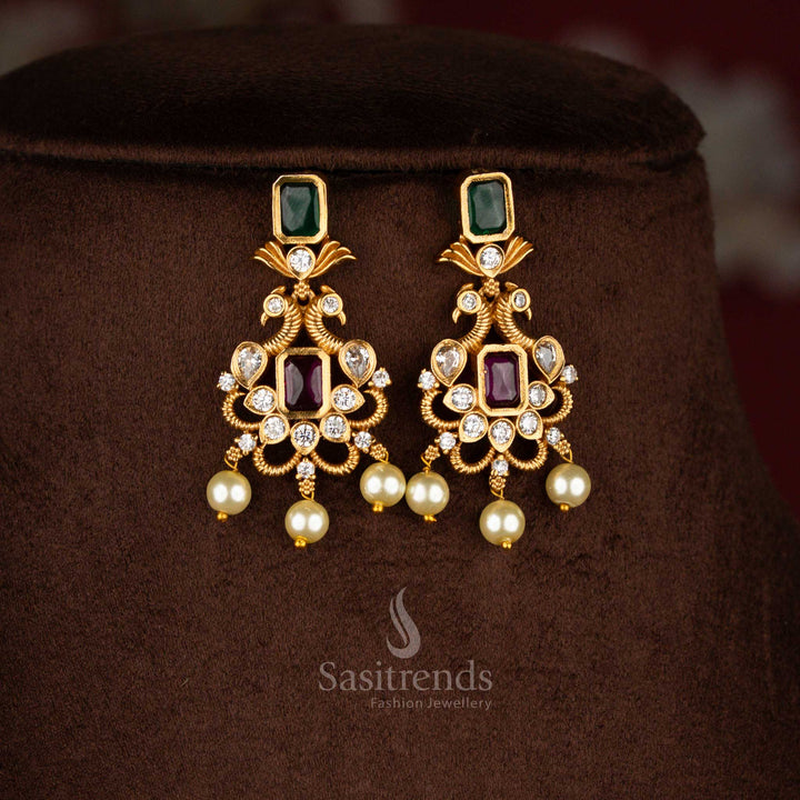 Traditional ruby-green AD crystal stones temple choker jewellery set with iconic peacock centrepiece, matte gold finish and sparkling – Sasitrends