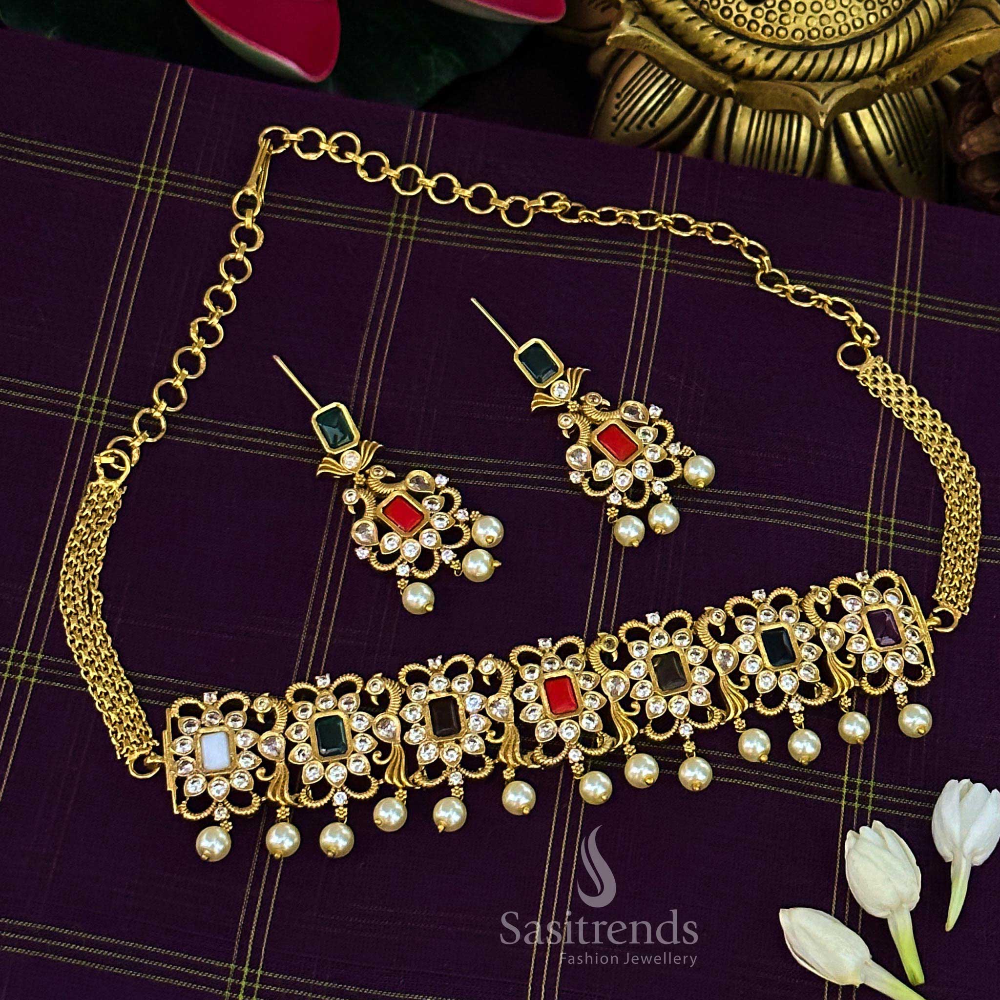 Regal Multi choker jewellery set with antique peacock design, temple matte gold finish, and colourful AD stone embroidery, perfect for traditional ceremonies – Sasitrends