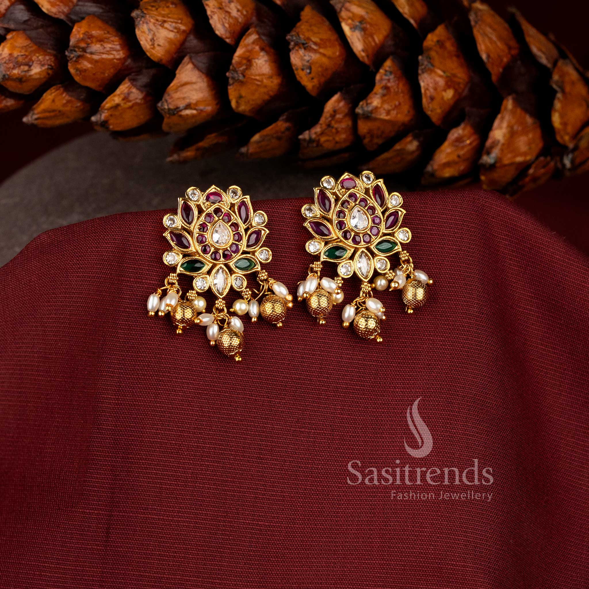 Temple matte gold finish, showcasing Ruby Multi and vibrant tones with pearl-bead details for a bold and bright bridal jewellery statement – sasitrends