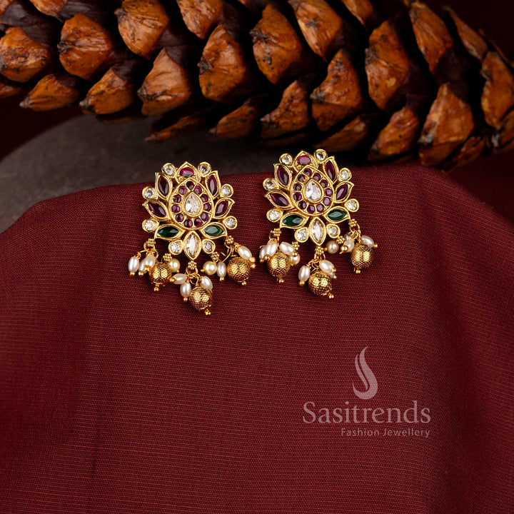 Temple matte gold finish, showcasing Ruby Multi and vibrant tones with pearl-bead details for a bold and bright bridal jewellery statement – sasitrends