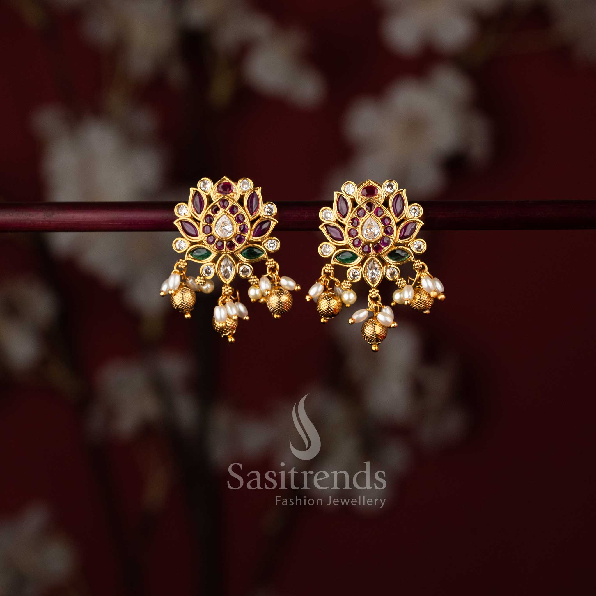 Temple matte gold finish, showcasing Ruby Multi and vibrant tones with pearl-bead details for a bold and bright bridal jewellery statement – sasitrends