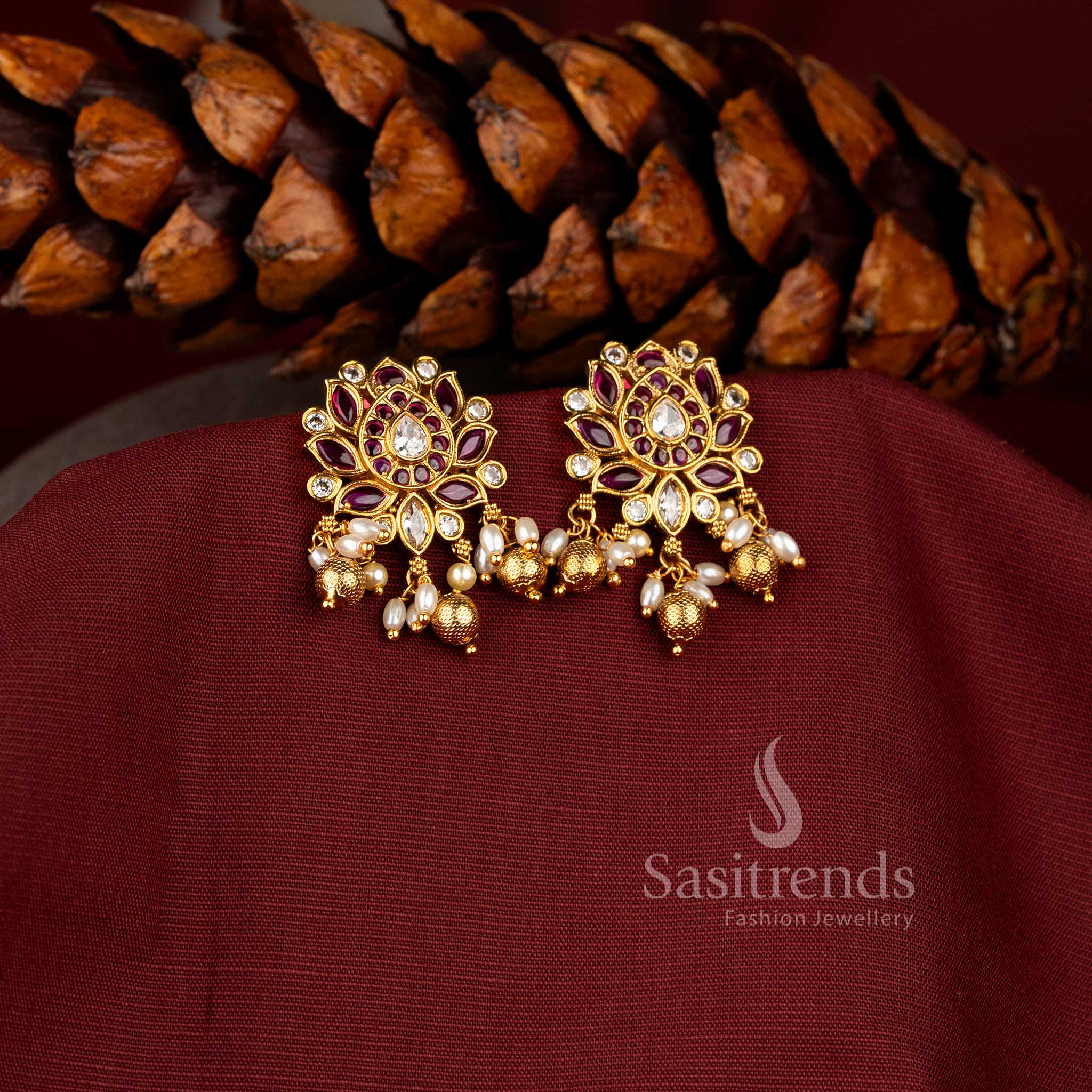 Temple matte gold finish, showcasing vibrant tones with pearl-bead details for a bold and bright bridal jewellery statement – sasitrends