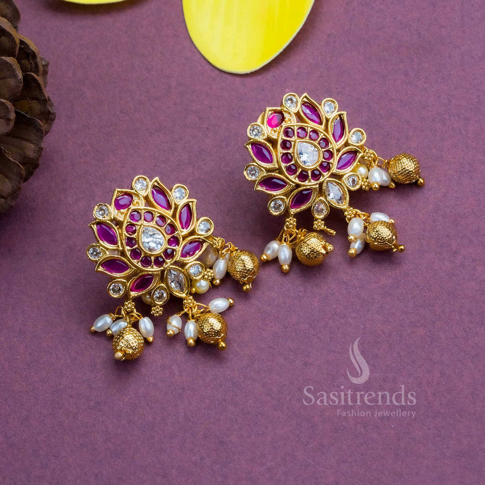 Traditional Earrings with Graceful Temple Gold Plated Lotus Floral Design, Kemp AD Stones in Ruby-White Hue, Pearls, and Bead Hangings