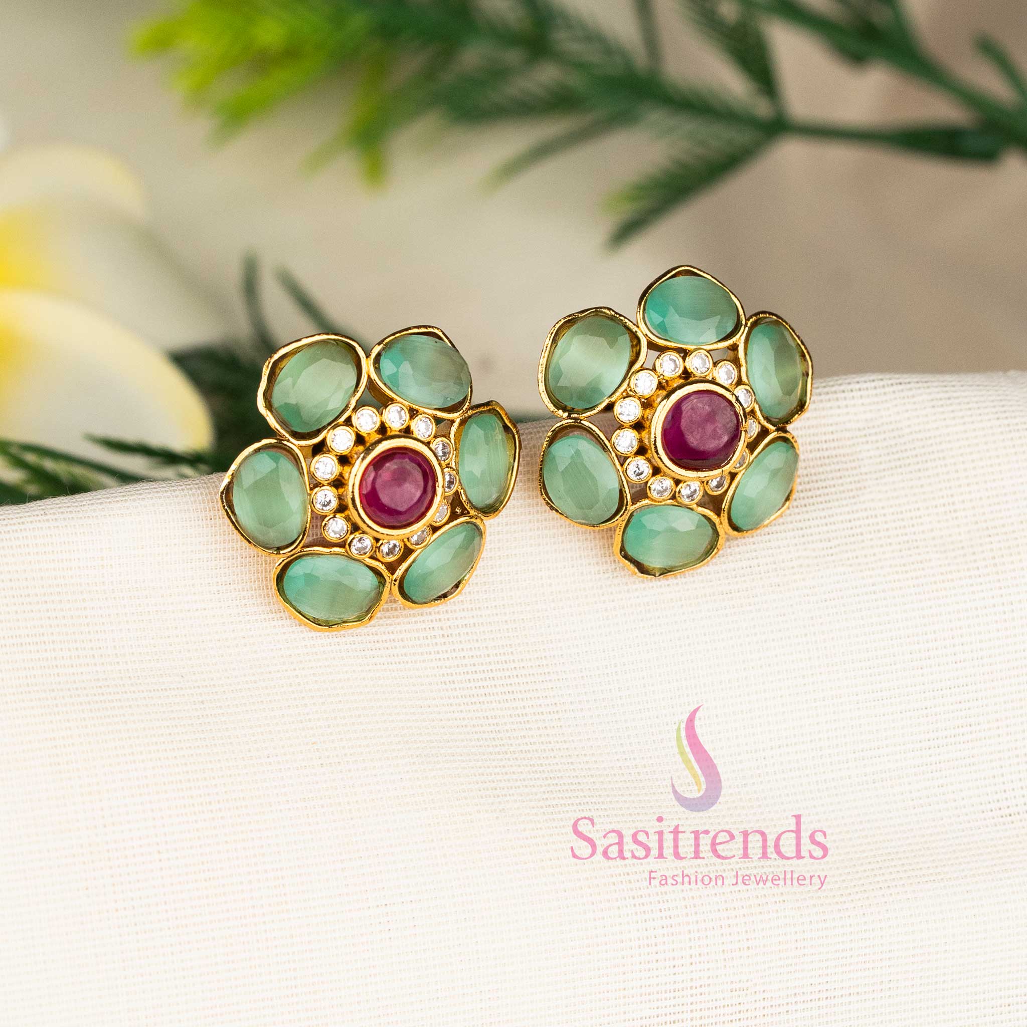 Elegant Mint Matte Gold Floral Stud Earrings Embellished With American Diamond Stone Highlights – Stylish Festive Jewellery With Refined Craftsmanship For Saree Wear - Sasitrends