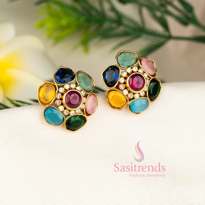 Elegant Matte Gold Floral Navarathna Stud Earrings Embellished With American Diamond Stone Highlights – Stylish Festive Jewellery With Refined Craftsmanship For Saree Wear - Sasitrends