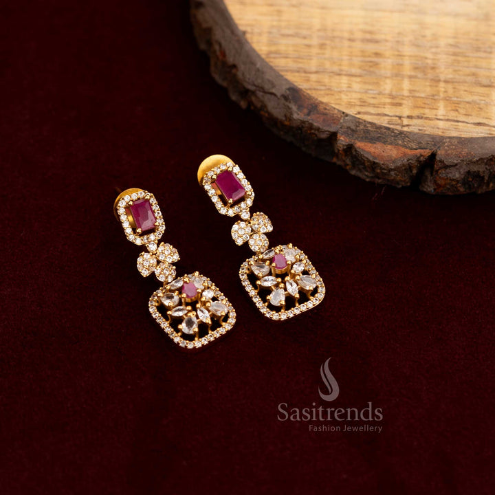 Elegant American Diamond long drop earrings with sparkling white and ruby stones, featuring a multi-structured design, perfect for lavish party wear jewellery ensembles - Sasitrends