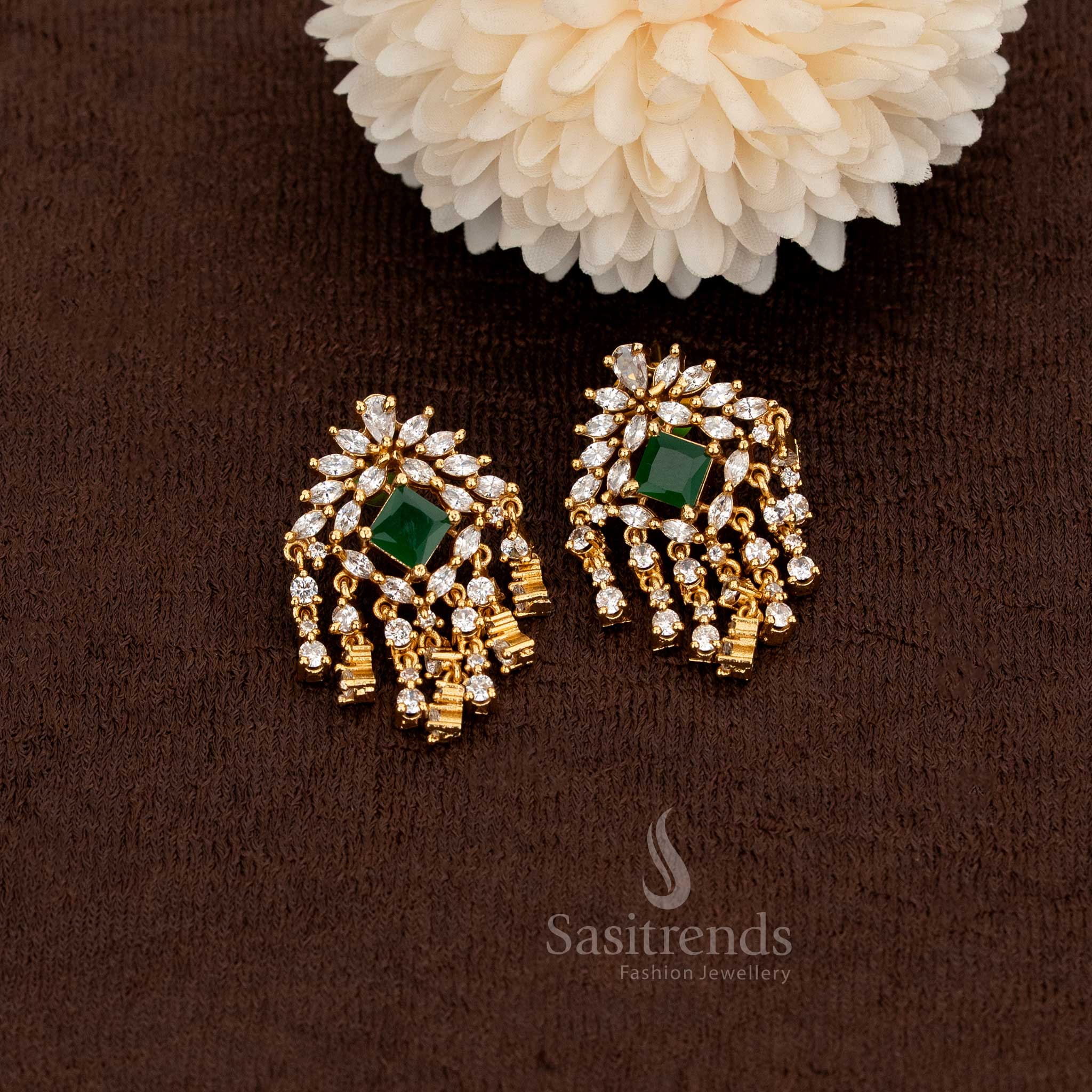 Chic matte gold plated floral and geometric stud earrings embellished with white and green American diamonds featuring an elegant cascading dangler – Sasitrends
