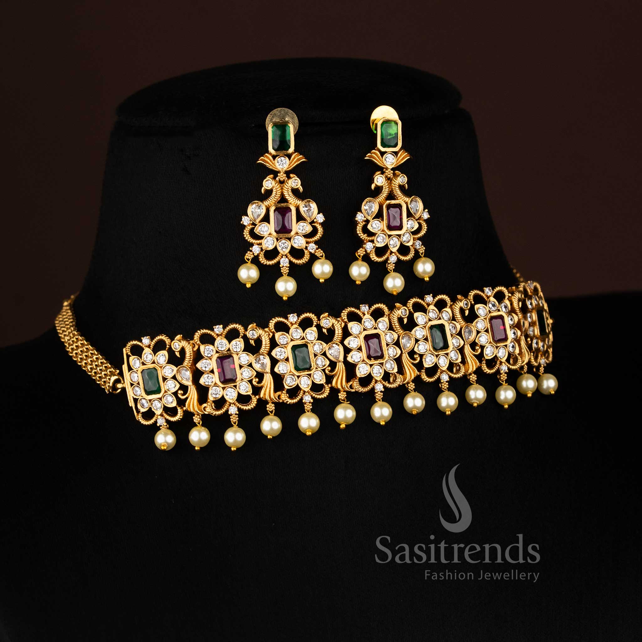 Matte gold plated peacock choker necklace, showcasing an elegant combination of deep ruby Green and accents and dangling pearls, ideal for festive occasions from Sasitrends