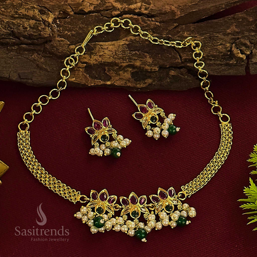A heritage-inspired temple matte gold plated lotus-inspired choker AD jewellery set for women, featuring classic designs and brilliant AD stones, celebrating timeless cultural beauty from Sasitrends