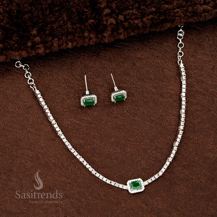 Green American diamond rectangle necklace with rhodium polish, shimmering centre stone and matching earrings – a refreshing festive jewellery piece for elegant occasions by Sasitrends