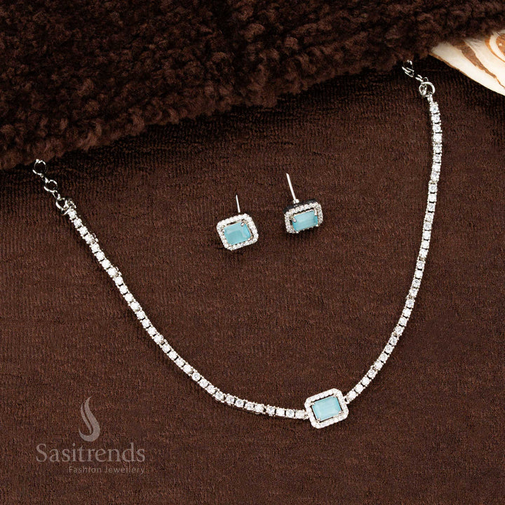 Sky-Blue green rectangular American diamond pendant necklace with rhodium-layered shine and sparkling matching earrings – a delicate and unique festive jewellery piece by Sasitrends