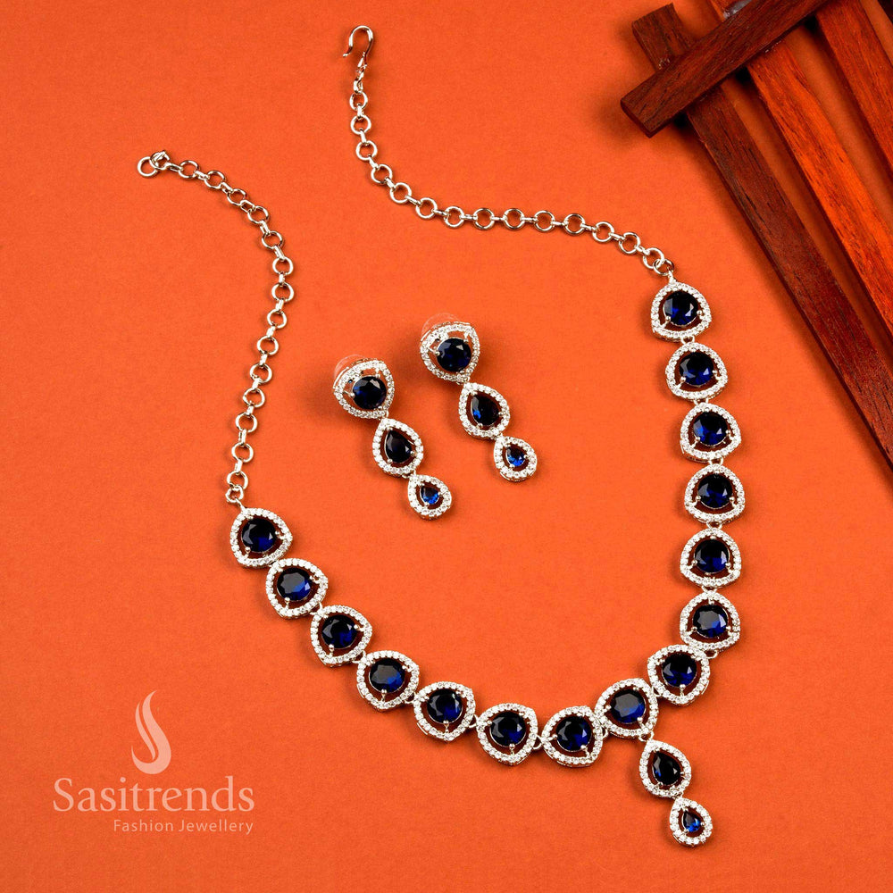 Elegant oval pattern rhodium silver blue party wear jewellery set adorned with American diamond stones, radiating classy glamour and cocktail night sparkle – Sasitrends
