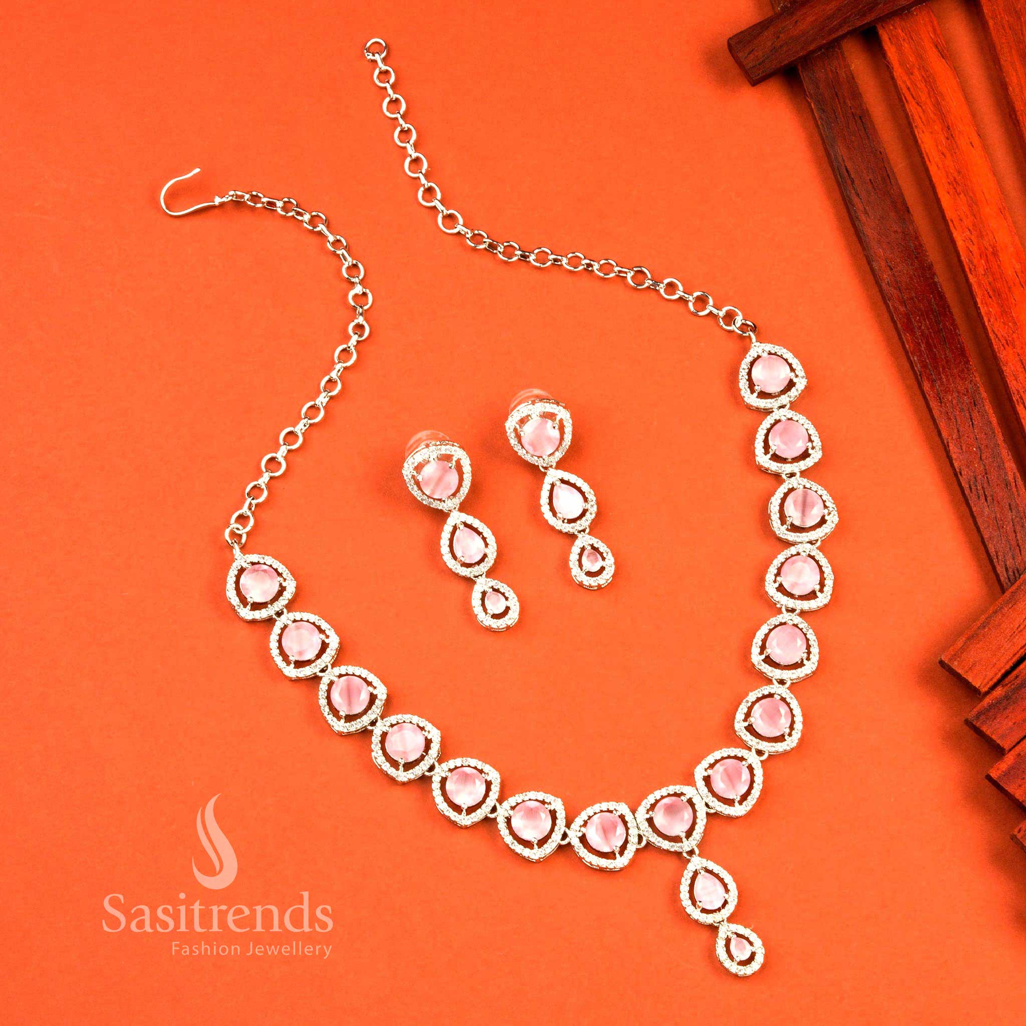 Delicate pink oval rhodium silver jewellery set enhanced with charming American diamond stones, perfect for elegant and graceful party styling – Sasitrends