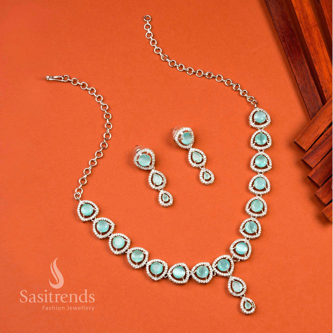 Mint oval pattern rhodium silver jewellery set for party occasions, featuring American diamond stones and a touch of modern elegance – Sasitrends