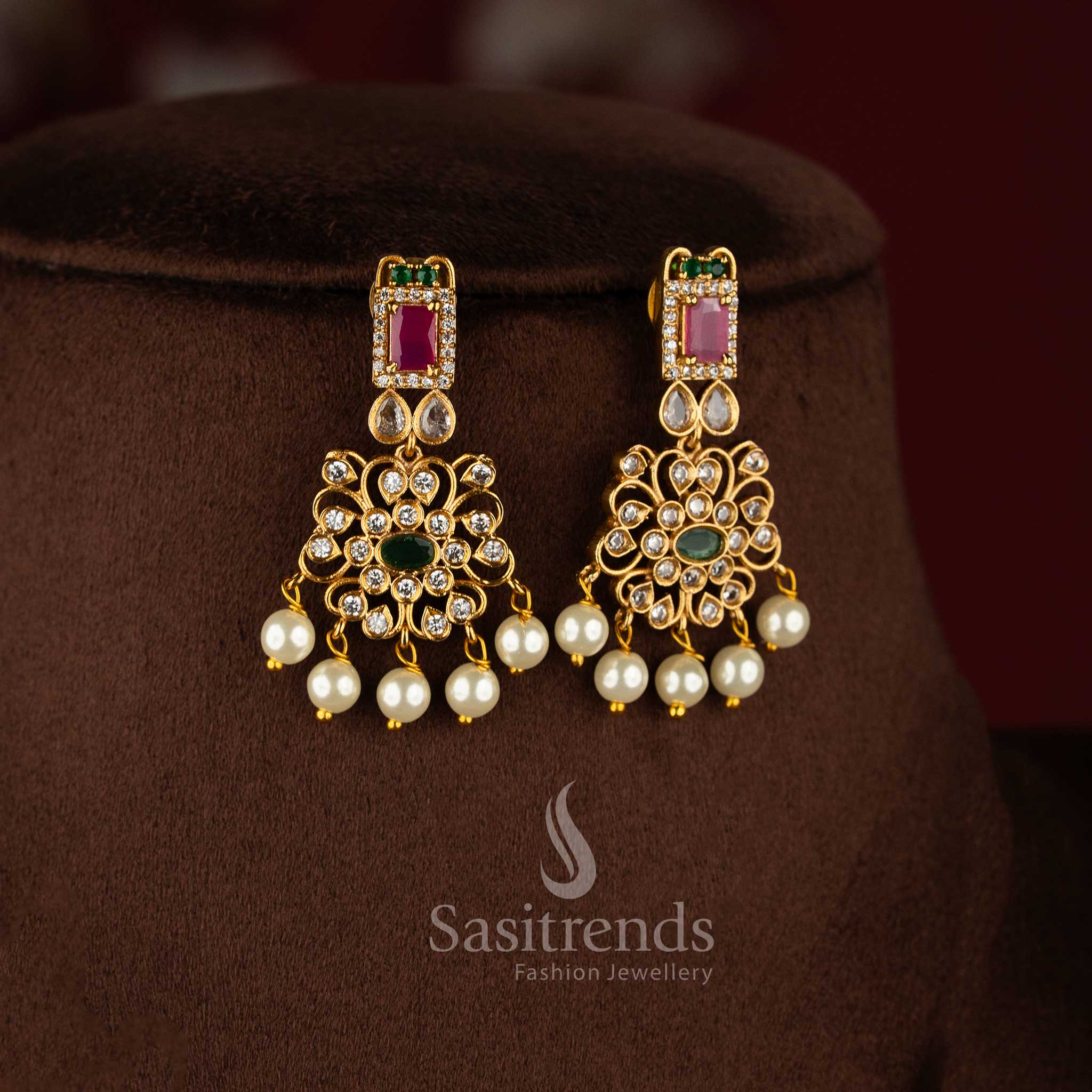 Traditional trendy floral choker necklace jewellery set with AD stones and pearl drops in temple matte gold plating by Sasitrends.