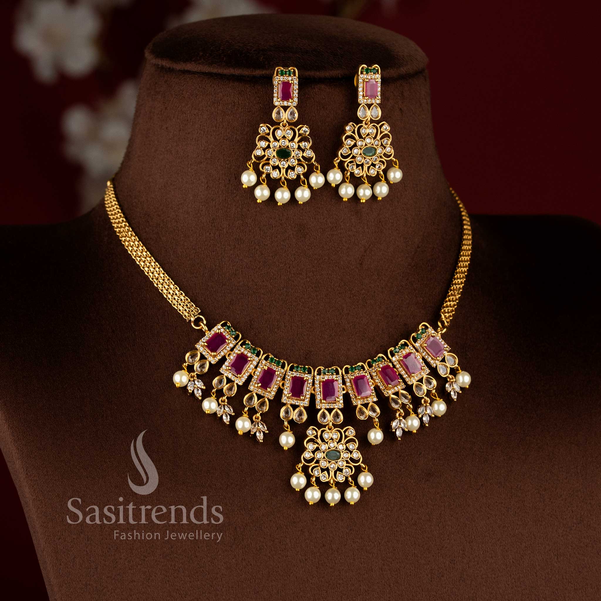 Traditional trendy floral choker necklace jewellery set with AD stones and pearl drops in temple matte gold plating by Sasitrends.