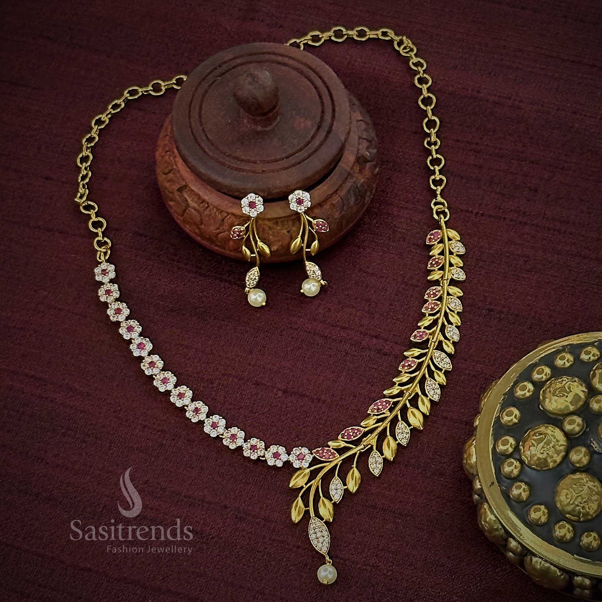 Elegant Party Wear Temple Gold Plated Floral & Leaf Necklace Set with White Ruby Stones - Matte Gold AD Jewelry for Women