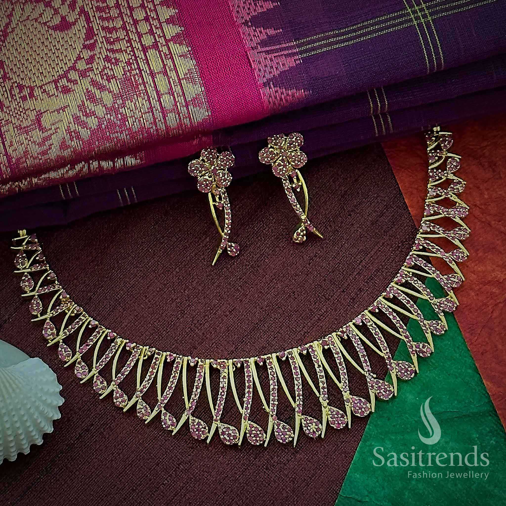 Classic ruby floral choker jewellery set in temple matte gold finish, detailed with rich kemp stone embellishments for festive opulence – Sasitrends