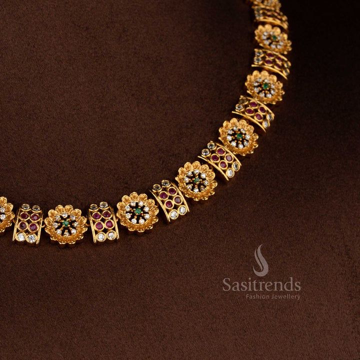 Stunning temple matte gold plated floral and rectangular pattern jewellery set with emerald green, ruby, and AD stones – an elegant fusion necklace designed for traditional ethnic wear – Sasitrends
