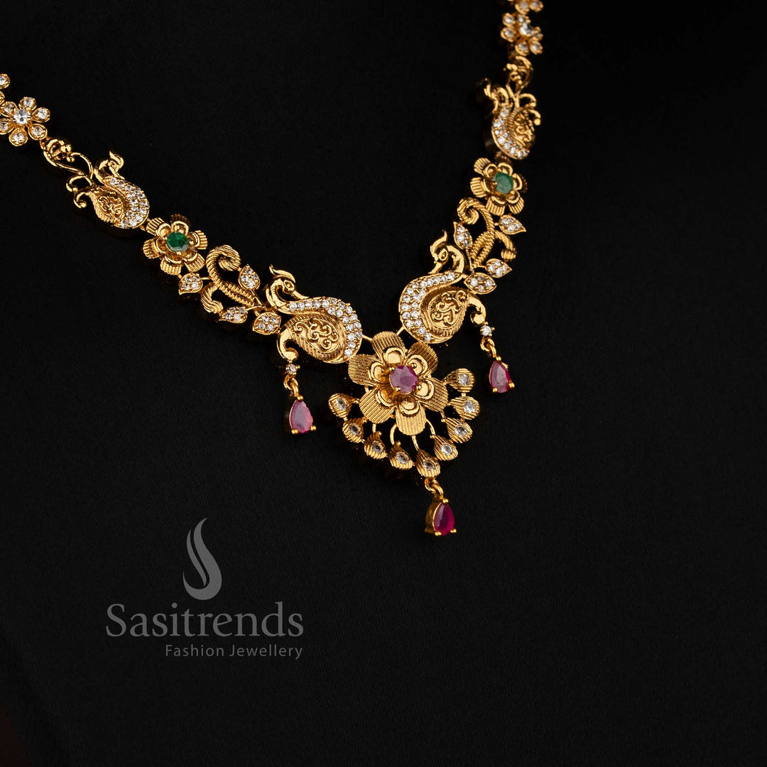 Gorgeous Peacock and Flower Necklace Set: Ruby Hangings, American Diamond Stones, Brass Material, Matte Gold Finish - Sasitrends