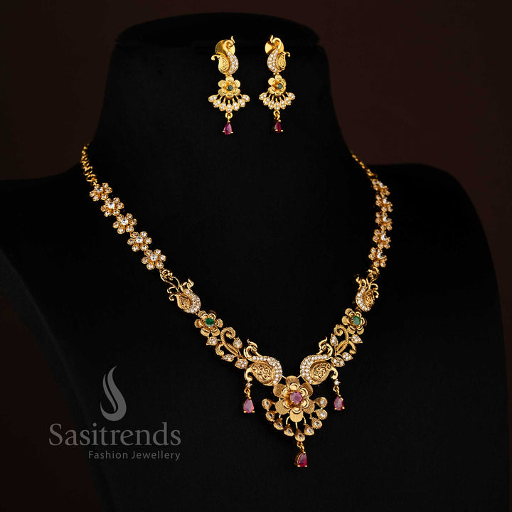 New Temple Matte Gold Tone Peacock and Flower Necklace Jewellery Set: Ruby Hangings and AD Stones