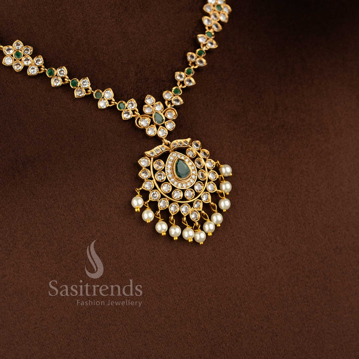 Elegant traditional green stone necklace designed with floral motifs and AD stone detailing - Sasitrends