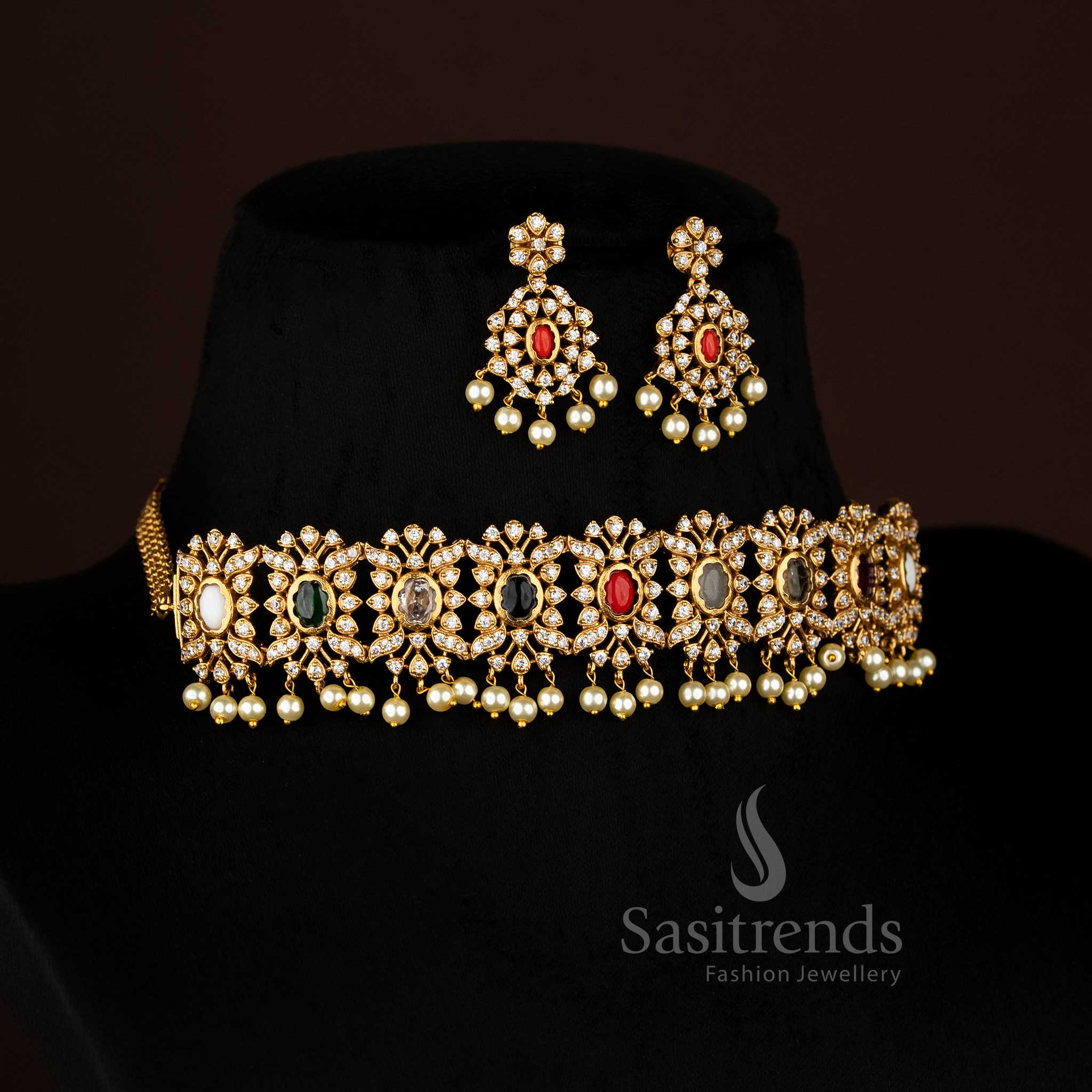 Vibrant Multi stone floral choker jewellery set with temple matte gold plating, pearl-laced contours, and artistic AD sparkle, perfect for celebratory occasions – Sasitrends