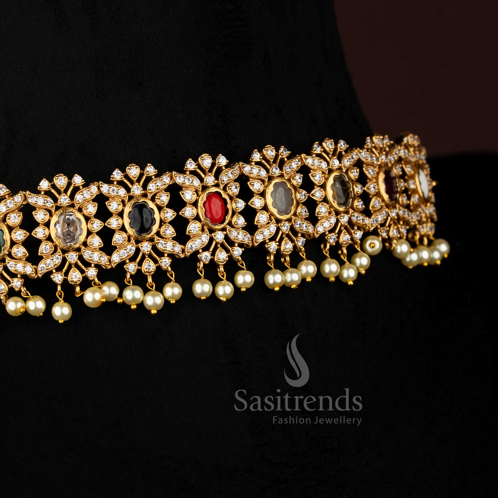 Vibrant Multi stone floral choker jewellery set with temple matte gold plating, pearl-laced contours, and artistic AD sparkle, perfect for celebratory occasions – Sasitrends