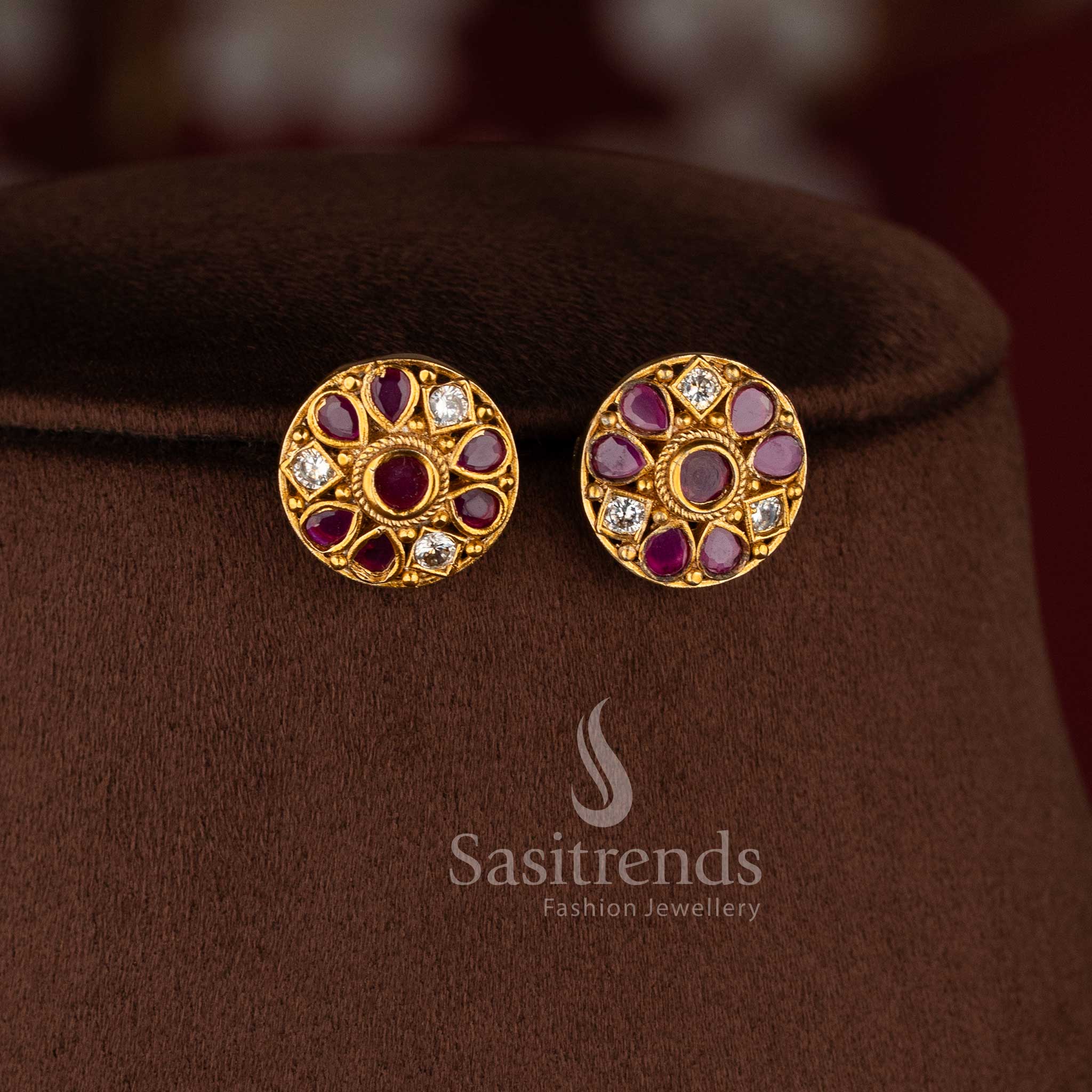 Elegant matte gold floral necklace set with ruby stone and pearl detailing for women.
