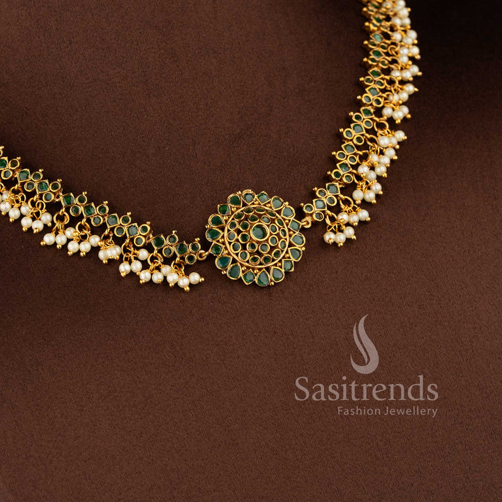 Gorgeous floral pendant temple matte gold plated choker necklace set with AD stones and pearl drops in green by Sasitrends.