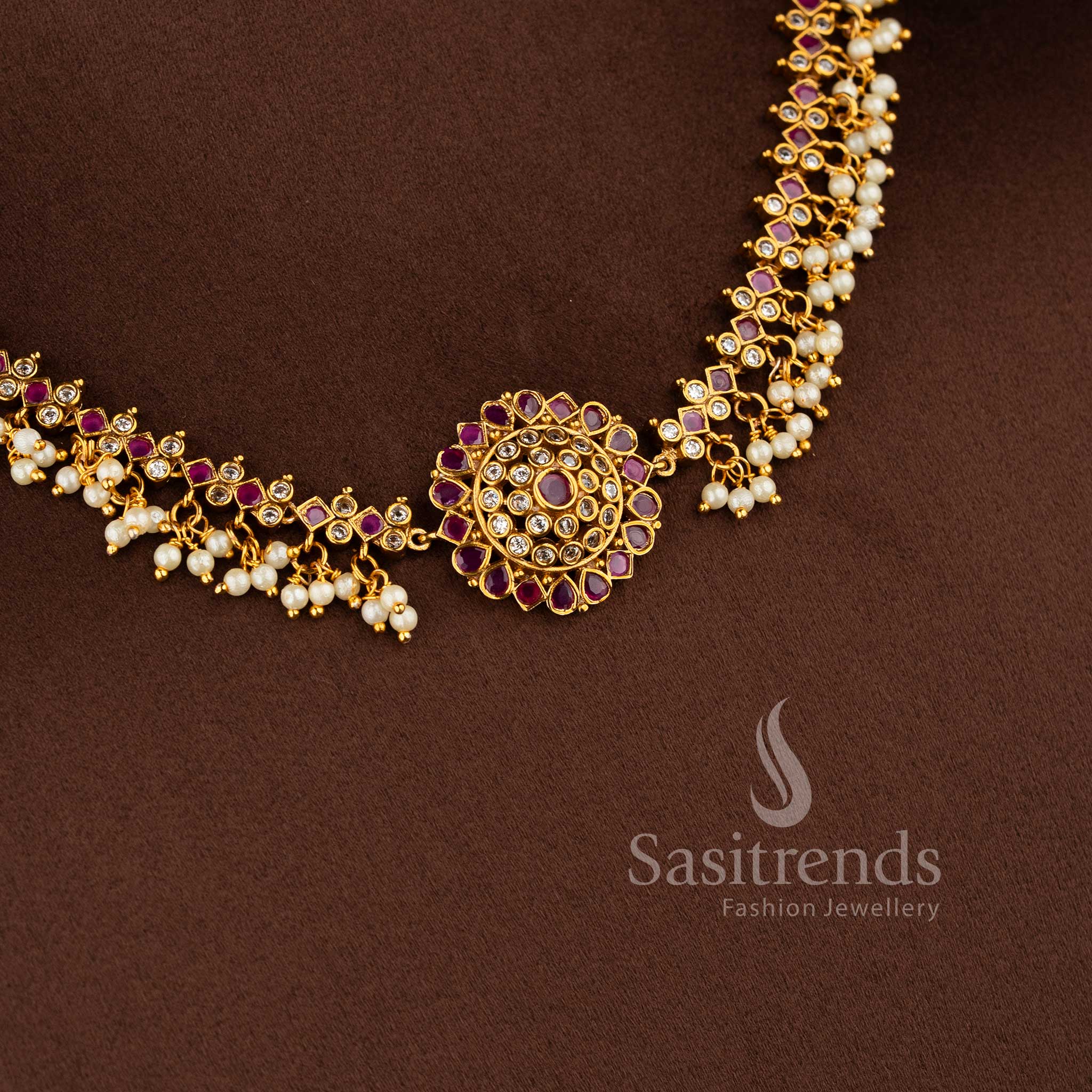 Traditional matte gold plated peacock choker necklace set with jhumkas and AD stones in ruby white by Sasitrends.
