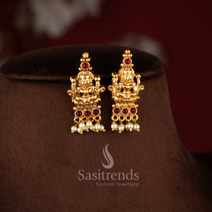 Elegant temple matte gold Lakshmi motif necklace set with kemp AD stones for festive wear - Sasitrends