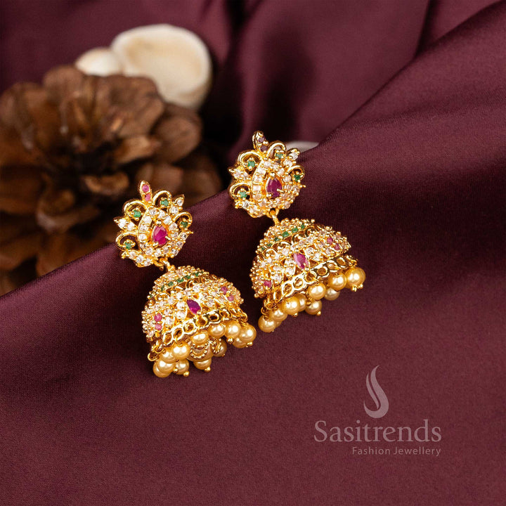 Enchanting traditional micro gold jhumka earrings with glittering AD stones and pearl strand drops – perfect for South Indian celebration style – Sasitrends