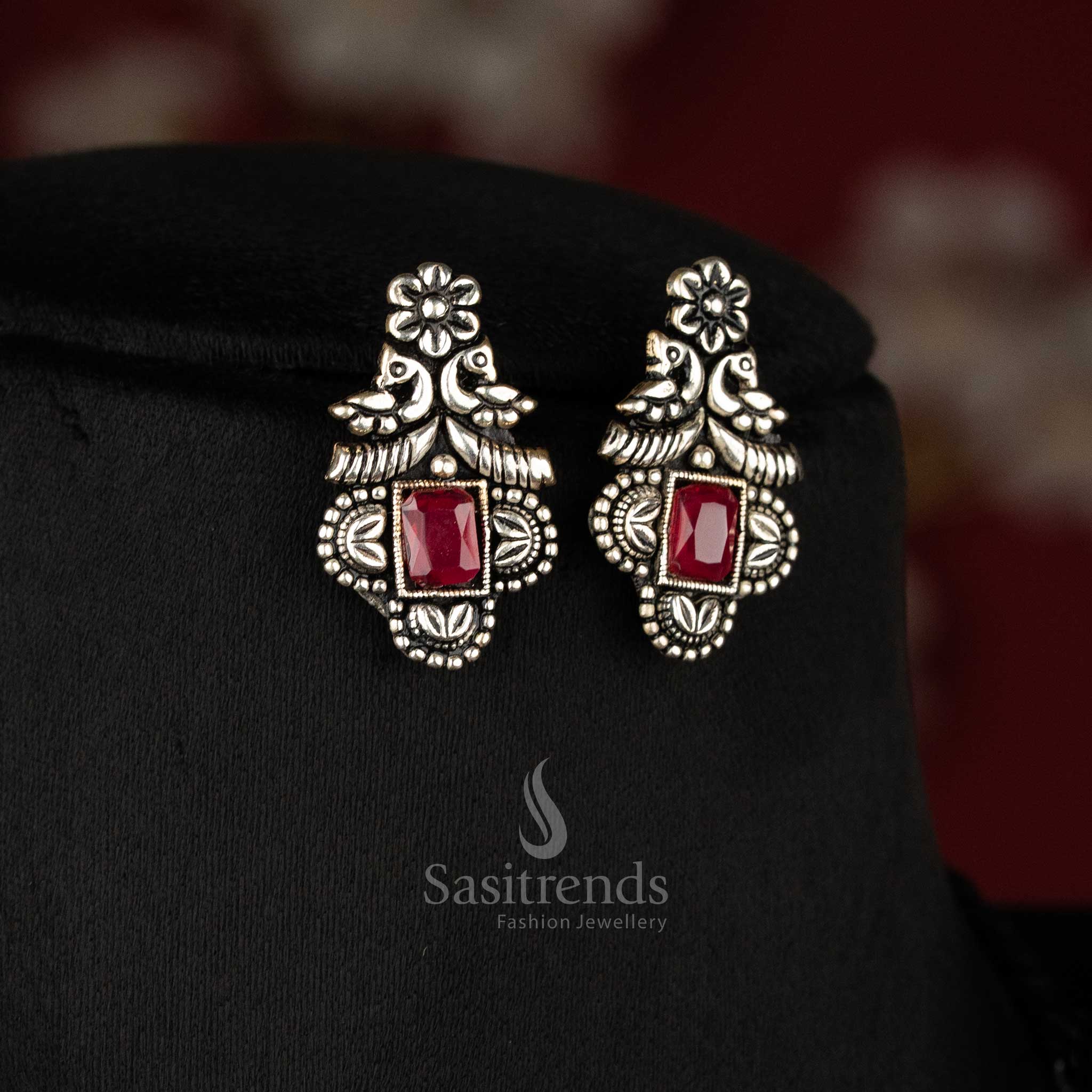 Vintage-inspired oxidised silver jewellery set showcasing deep ruby rectangular stones and intricate earrings - Sasitrends 