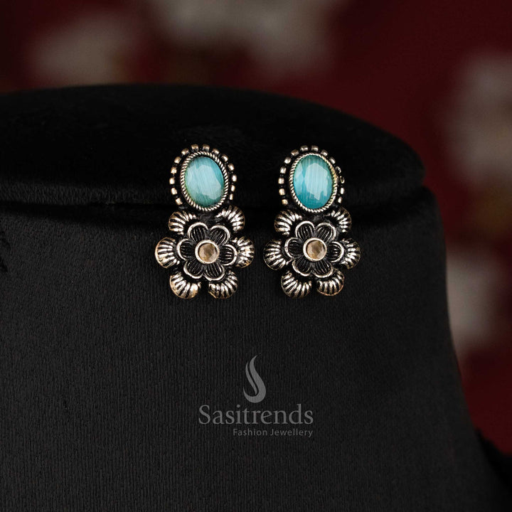 Elegant oxidised floral necklace set featuring mint oval-shaped stones and artistic earrings, offering an exquisite traditional jewellery touch - Sasitrends