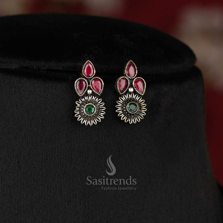 Heritage-inspired oxidised floral necklace set featuring ruby-green tear drop stones, floral motifs, and detailed earrings - Sasitrends