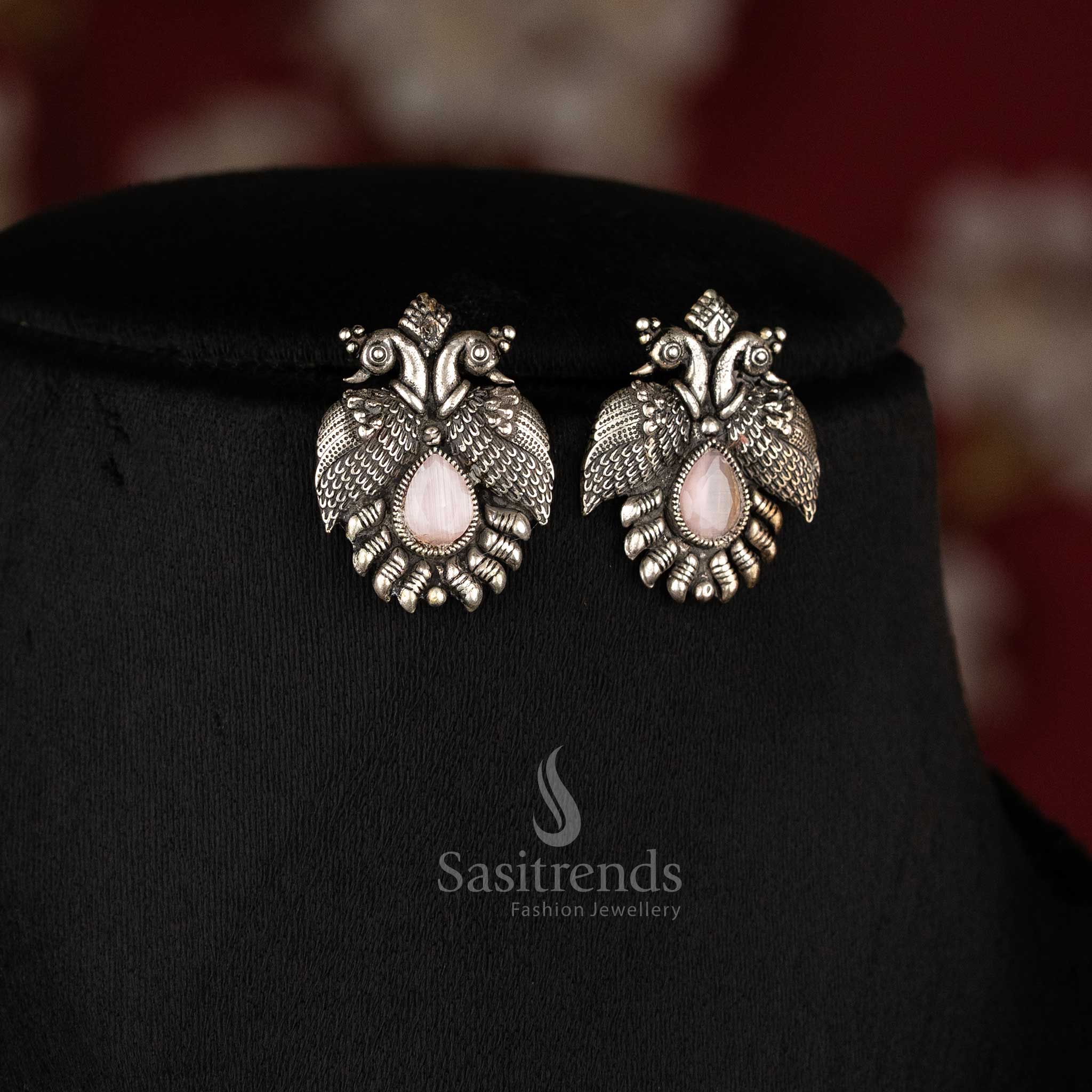 Royal handcrafted oxidised Kushi necklace set in silver, featuring contrasting pink mint -tear drop stones and peacock-shaped earrings - Sasitrends  