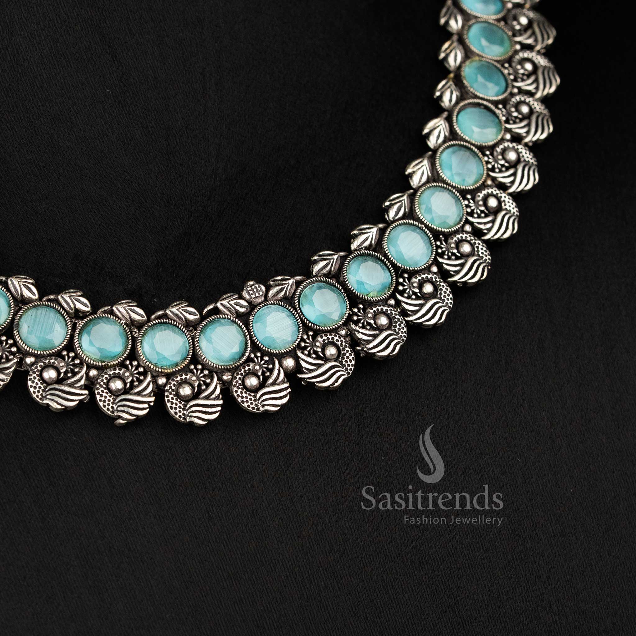 Heritage-inspired peacock Kushi oxidised necklace set featuring elegant mint stones and intricate peacock earrings, a modern ethnic jewellery masterpiece - Sasitrends