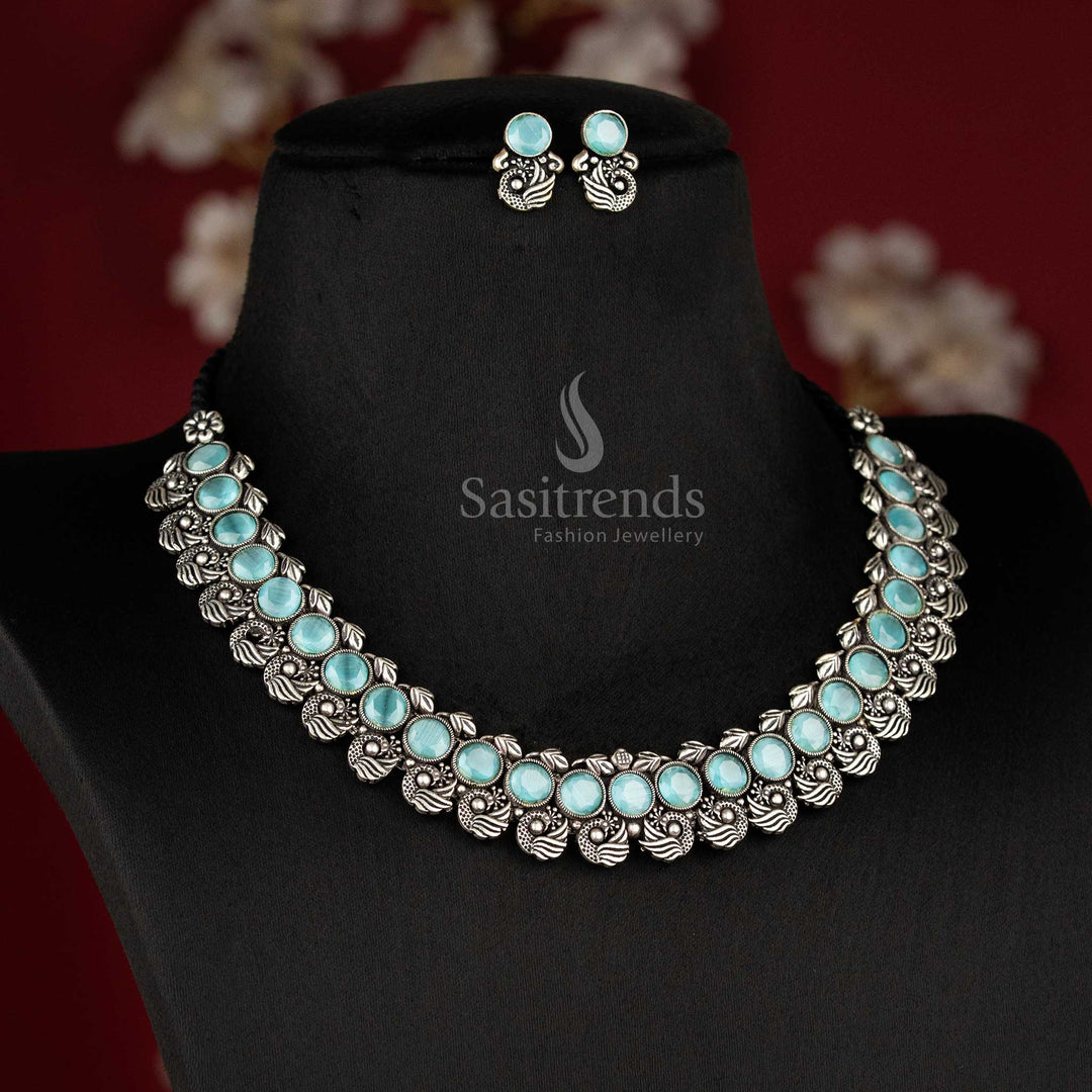 Heritage-inspired peacock Kushi oxidised necklace set featuring elegant mint stones and intricate peacock earrings, a modern ethnic jewellery masterpiece - Sasitrends