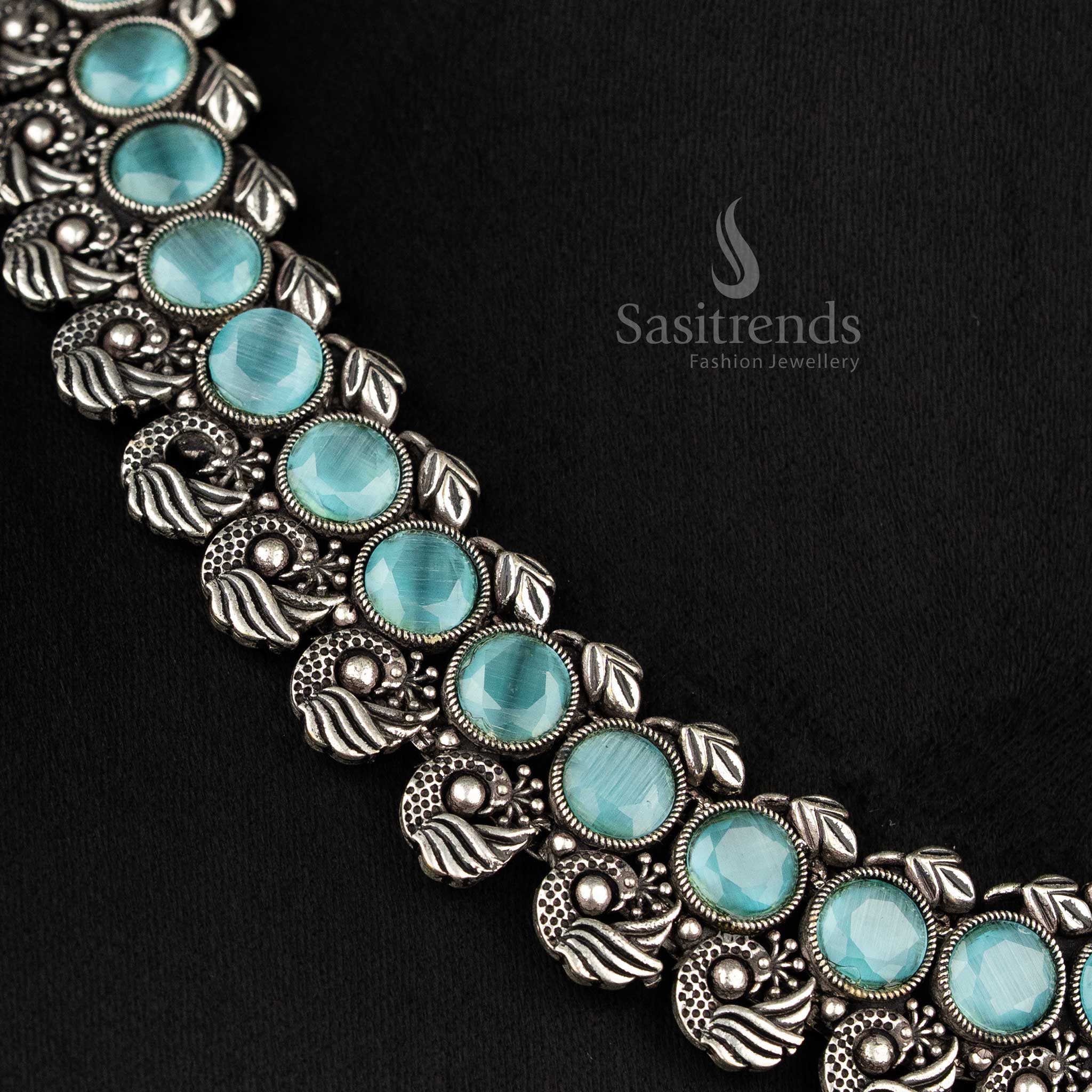 Heritage-inspired peacock Kushi oxidised necklace set featuring elegant mint stones and intricate peacock earrings, a modern ethnic jewellery masterpiece - Sasitrends