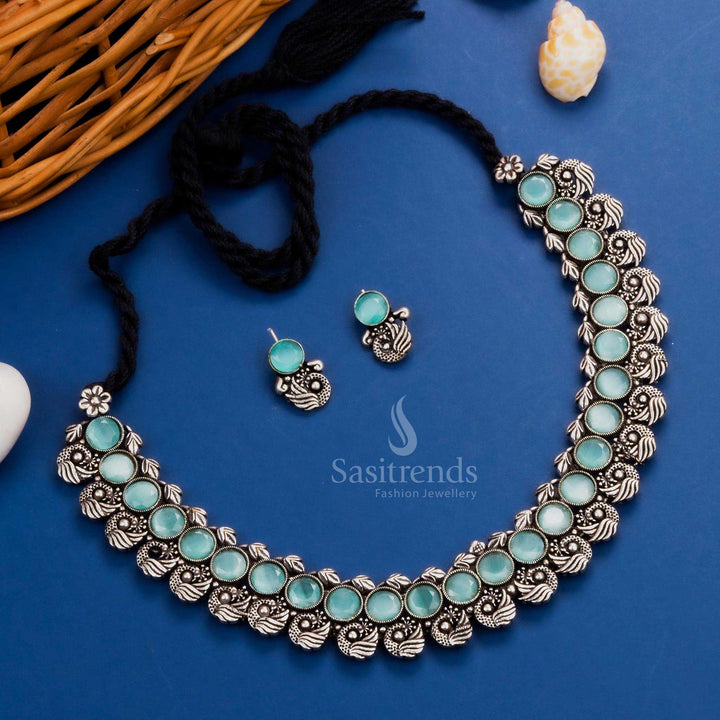 Heritage-inspired peacock Kushi oxidised necklace set featuring elegant mint stones and intricate peacock earrings, a modern ethnic jewellery masterpiece - Sasitrends