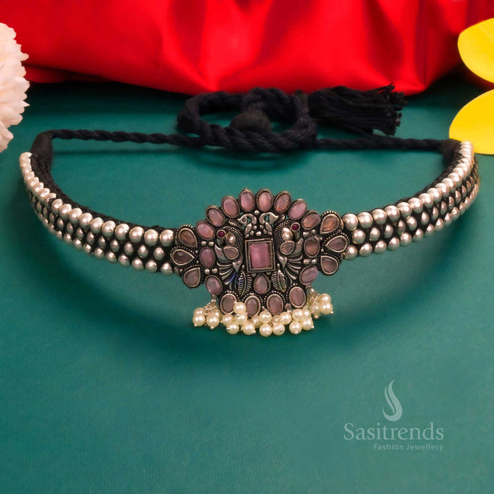 Bohemian-style Kolhapuri oxidised silver choker with a pink floral pendant, featuring a pearl-adorned layered structure for a trendy and fashionable appeal - Sasitrends