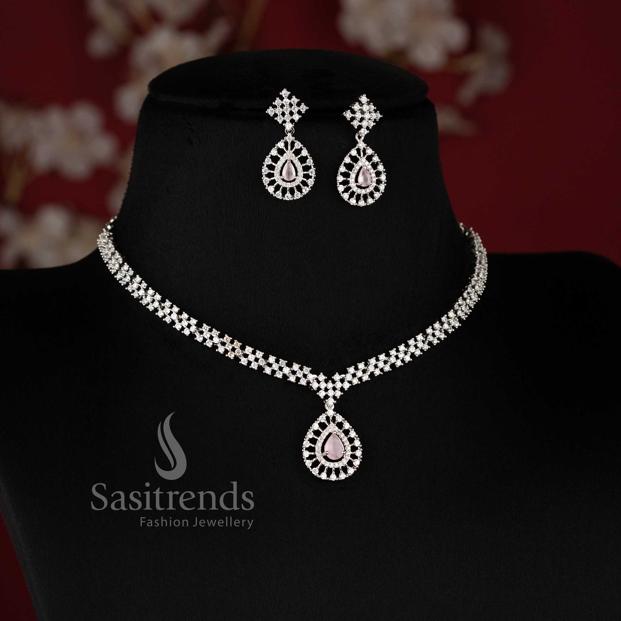 Party Wear American Diamond Necklace Jewellery Set featuring Rhodium Silver Plated Thilak Pendant with Pink Stone Accents - Sasitrends