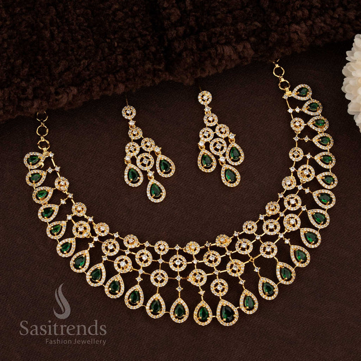 Elegant Floral American Diamond Choker Gold Plated Necklace Set With Teardrop Design And Pearl Drops In Lush Green Tone For Bridal Occasions, Festivals, And Saree Styling – Sasitrends