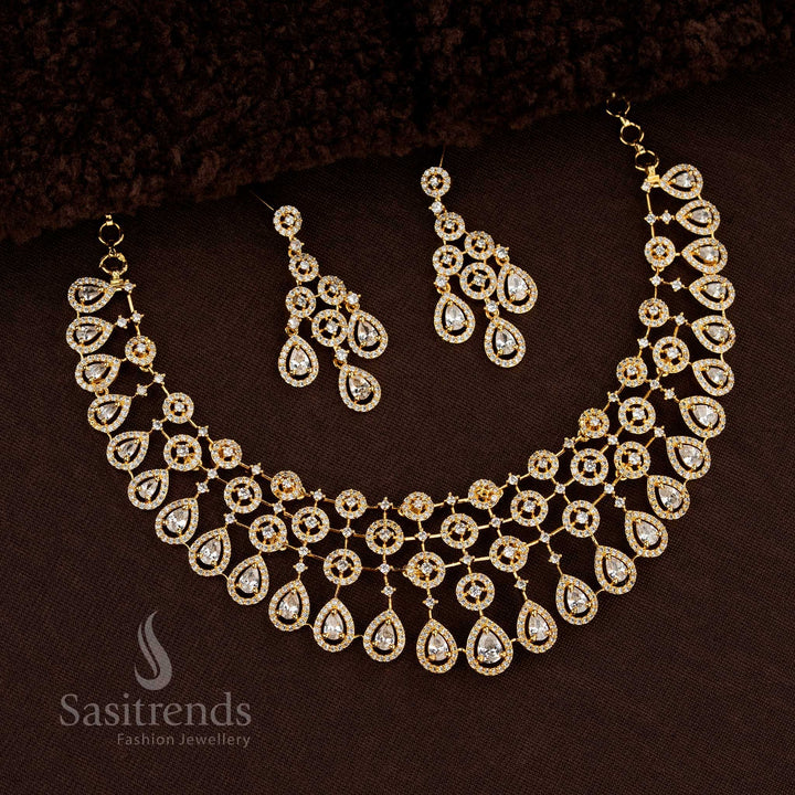 Elegant Gold Plated Choker Necklace Jewellery Set Adorned With American Diamonds And Artistic Floral Teardrop Motifs In A Lustrous White Tone, Perfect For Wedding Functions And Traditional Saree Looks – Sasitrends