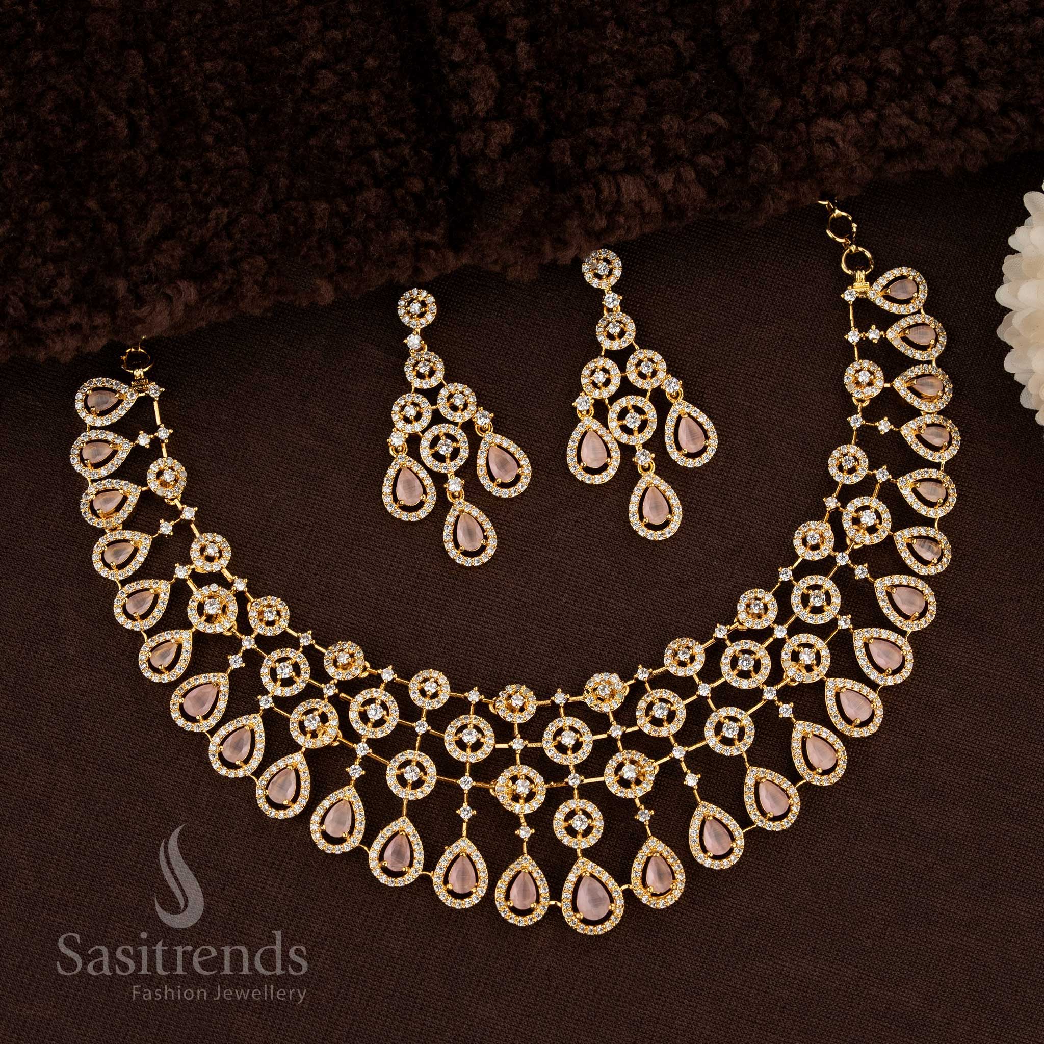 Graceful Gold Plated Choker Necklace Jewellery Set With American Diamonds And Floral Teardrop Accents In A Pastel Pink Tone For Elegant And Modern Traditional Looks – Sasitrends