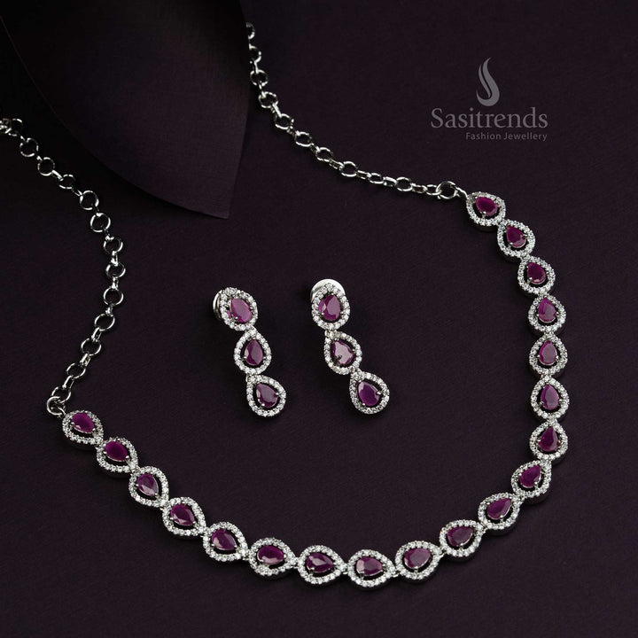 Gorgeous Thilak pattern rhodium silver plated jewellery set with rich ruby American Diamond stones, an exquisite festive wear accessory for traditional celebrations - Sasitrends