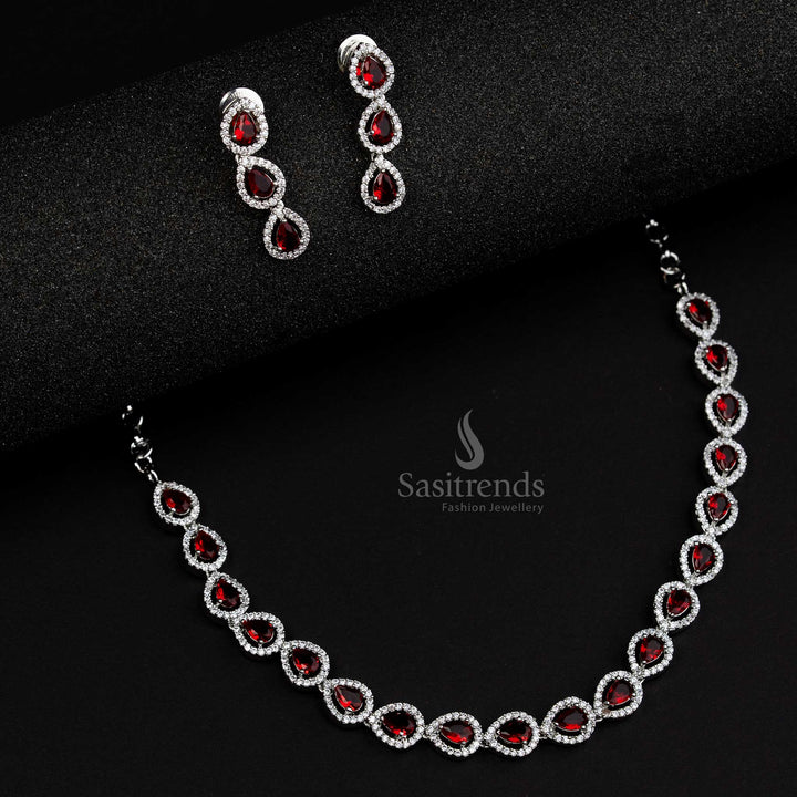 Vibrant red American Diamond jewellery set in Thilak pattern with rhodium silver plating, a festive statement piece for weddings and celebrations - Sasitrends