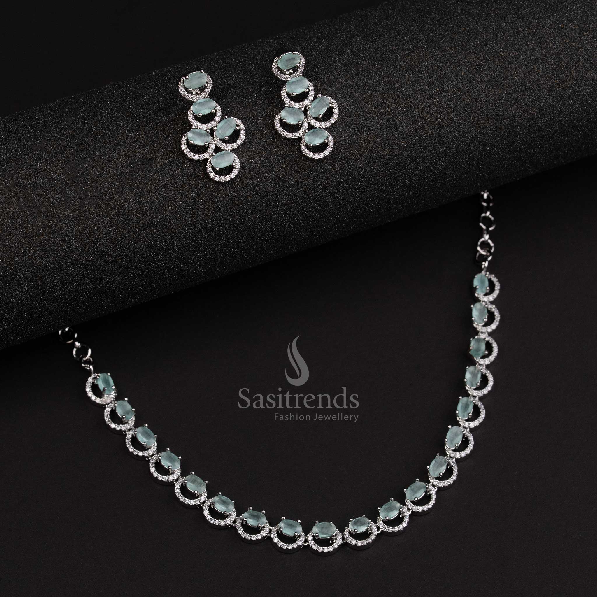 Mint green rhodium silver jewellery set with oval design and a fresh aesthetic, ideal for vibrant party wear – Sasitrends