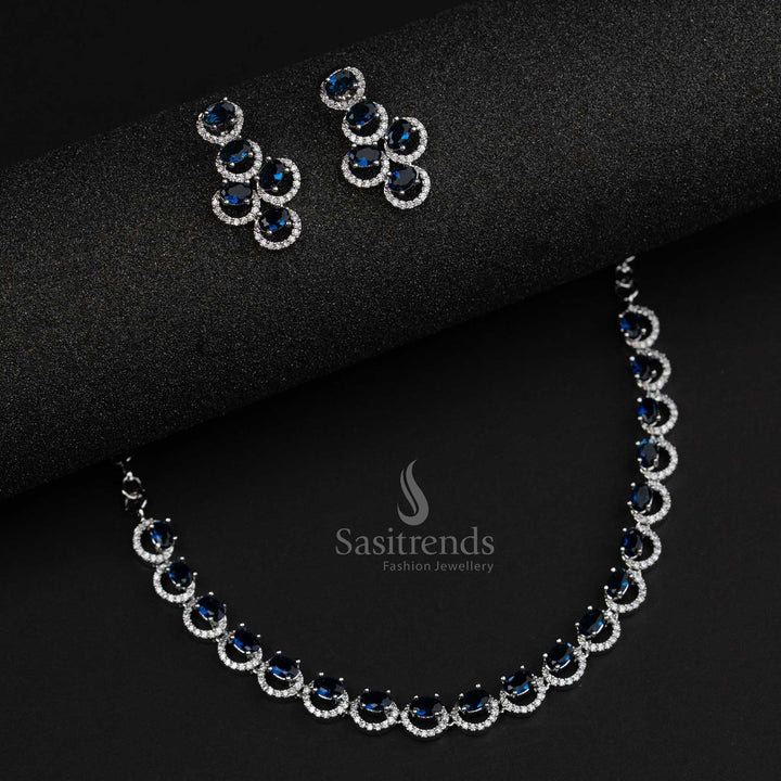Blue party wear jewellery set in rhodium silver with oval American diamond stones and a modern festive touch – Sasitrends